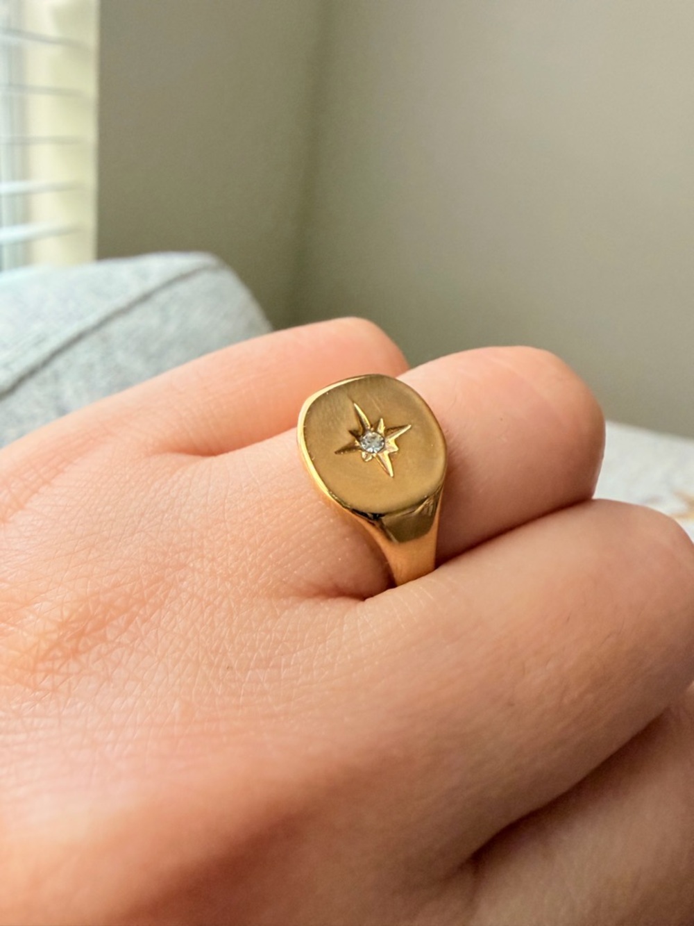 Gold Starburst Signet Ring with White Gemstone